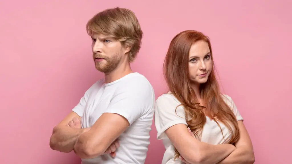close-up of a model and photographer reviewing a contract before a TFP photo shoot, symbolizing professionalism and legal clarity in creative collaborations.